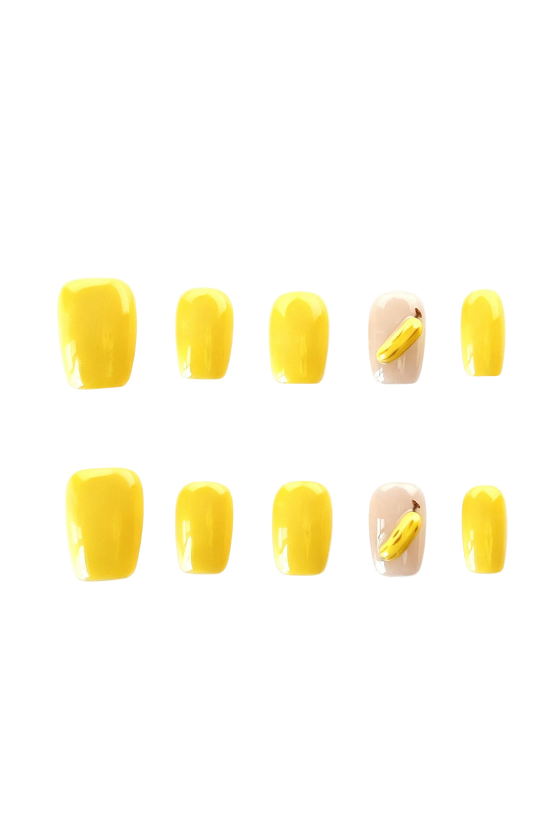 Banana Pop yellow press-on nails with 3D banana accent flatlay