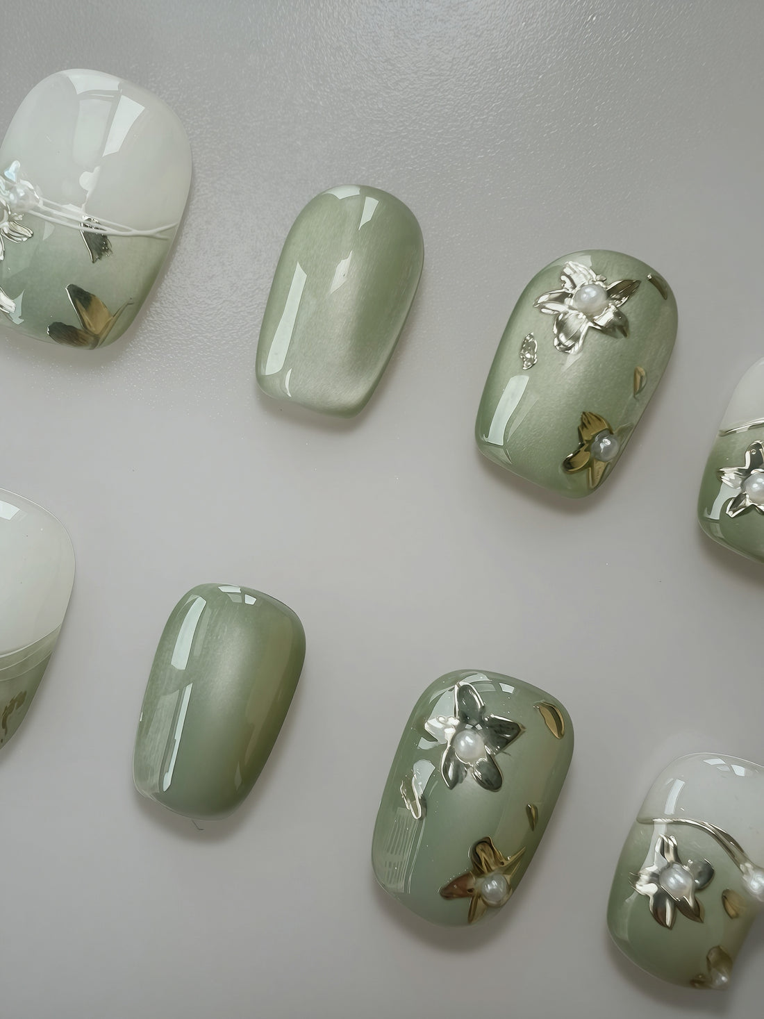 Dewy Blossom green and white floral press-on nails with gold details, square shape 16mm