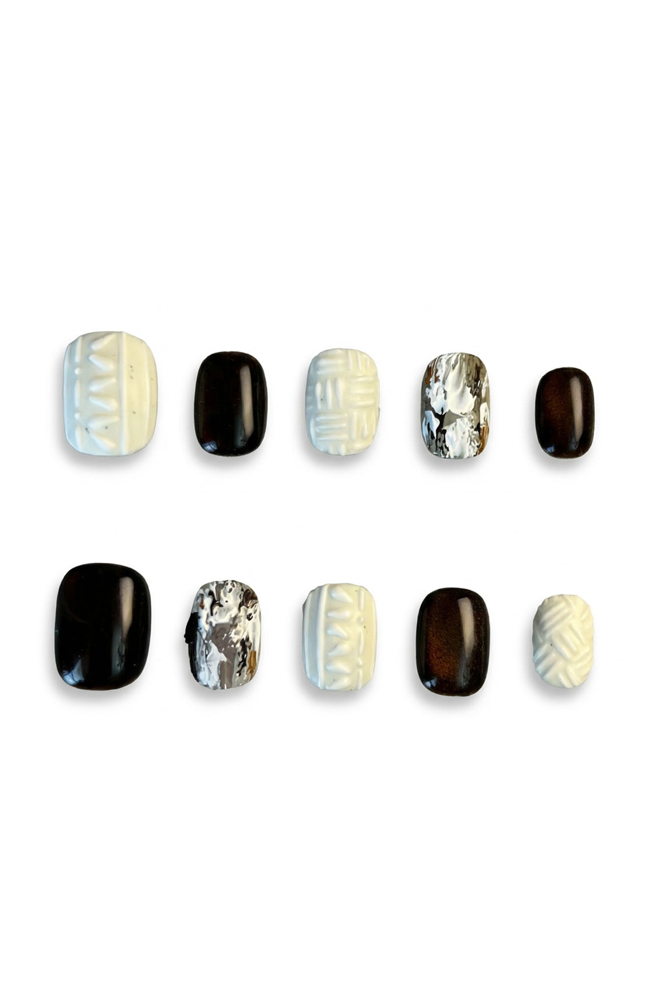 Knitted Chestnuts press-on nails featuring knitted textures, chestnut brown tones, glossy black and metallic marbled accents for a warm winter manicure.