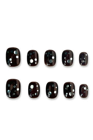 Espresso brown press-on nails with soft blueberry-toned dot details, winter neutral nail design by MOMENTO