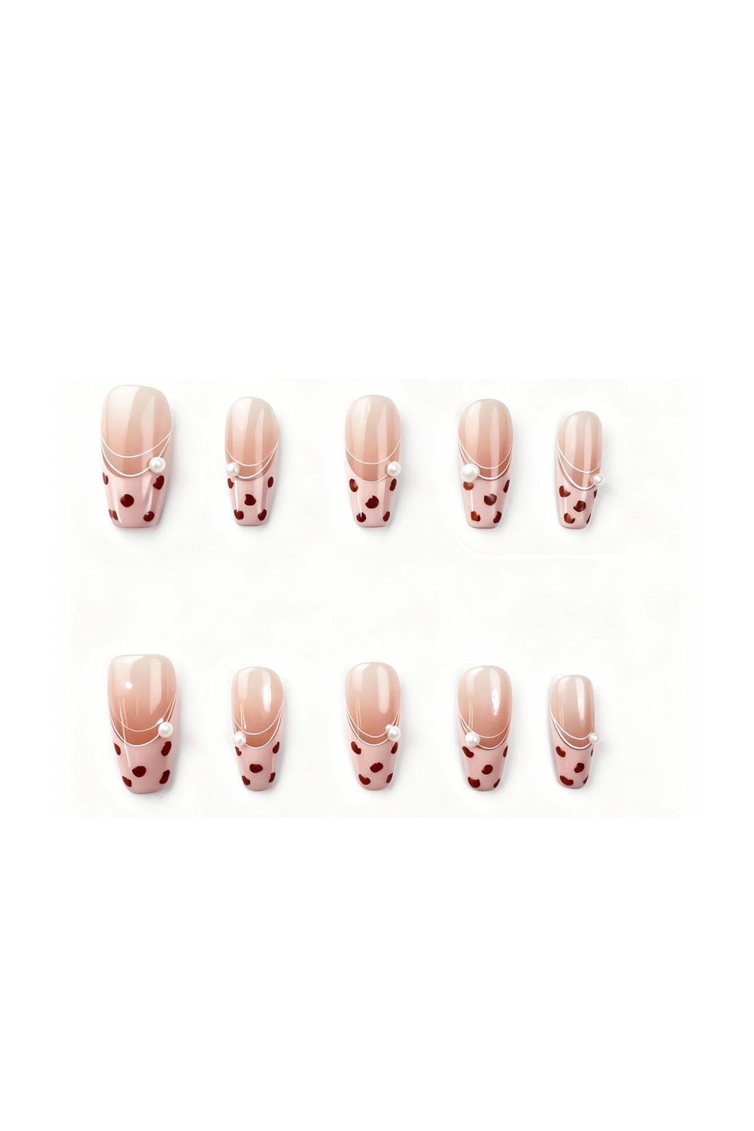 Gentle Wild press-on nails flatlay featuring blush-pink French tips with deep red leopard spots and tiny pearl details.