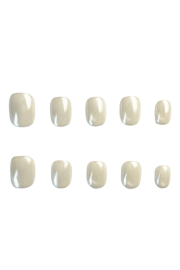 Milky white pearl press-on nails set on white background – short square shape