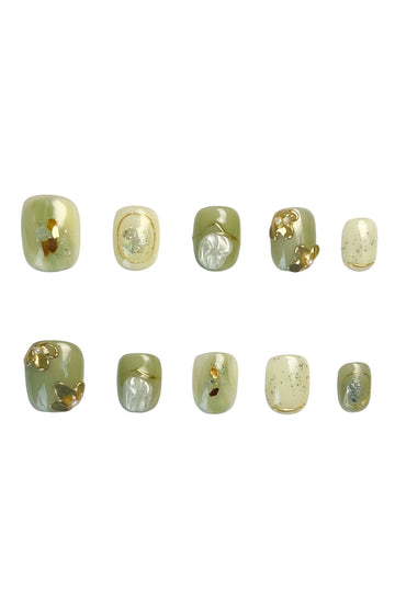 Olive gold press-on nails flatlay with pearl sheen and gold accents on white background