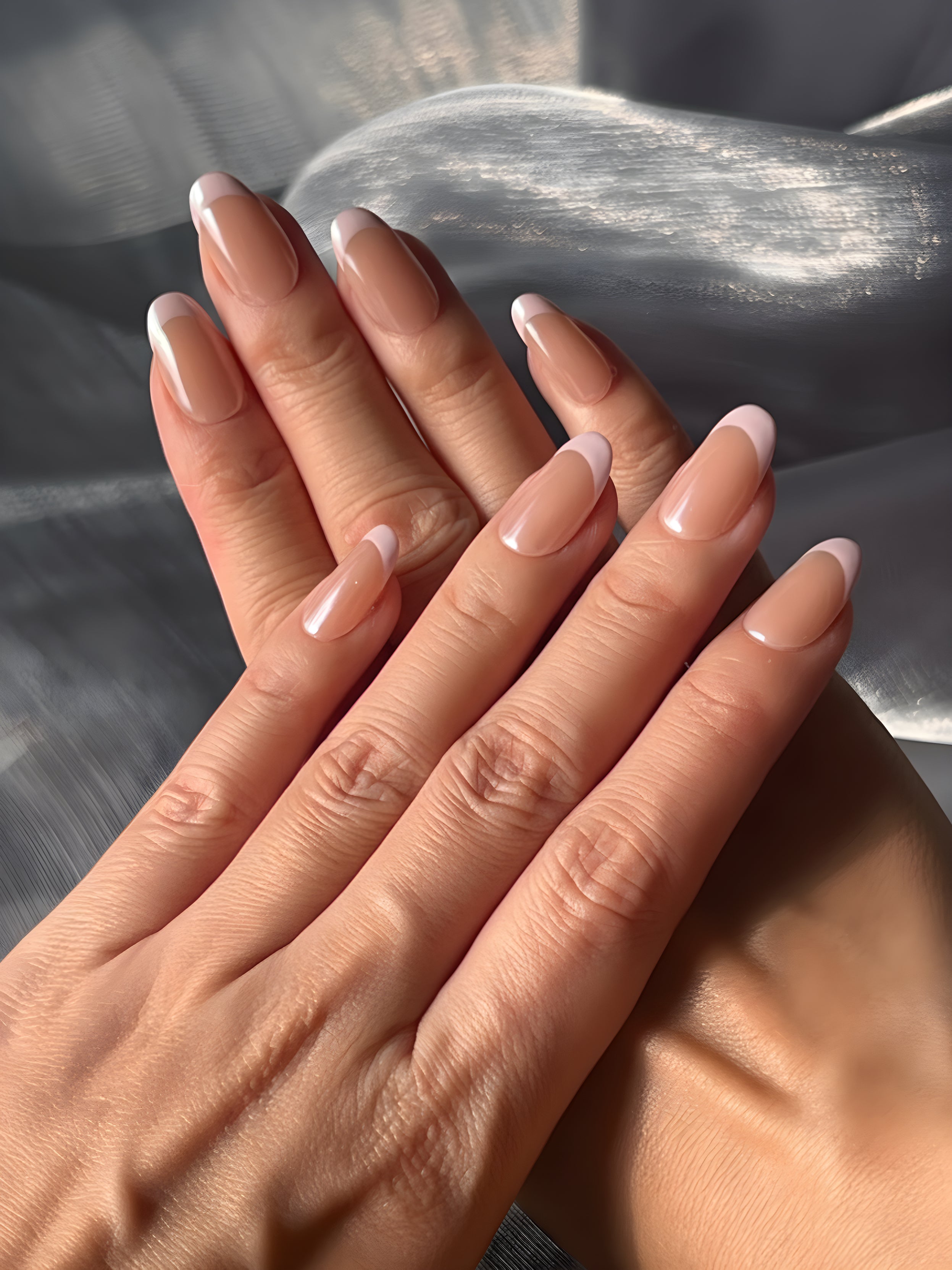 Model wearing Strawberry Milkshake nude pink French press-on nails in soft natural lighting